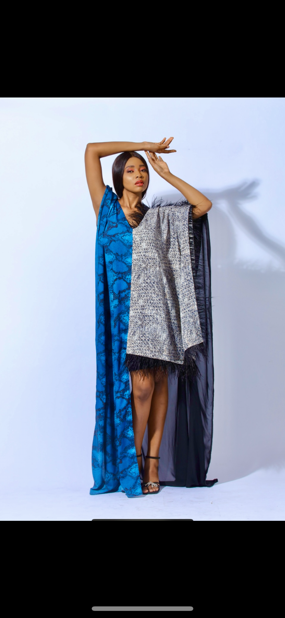 Robe impératrice Mombasa avec détails en plumes