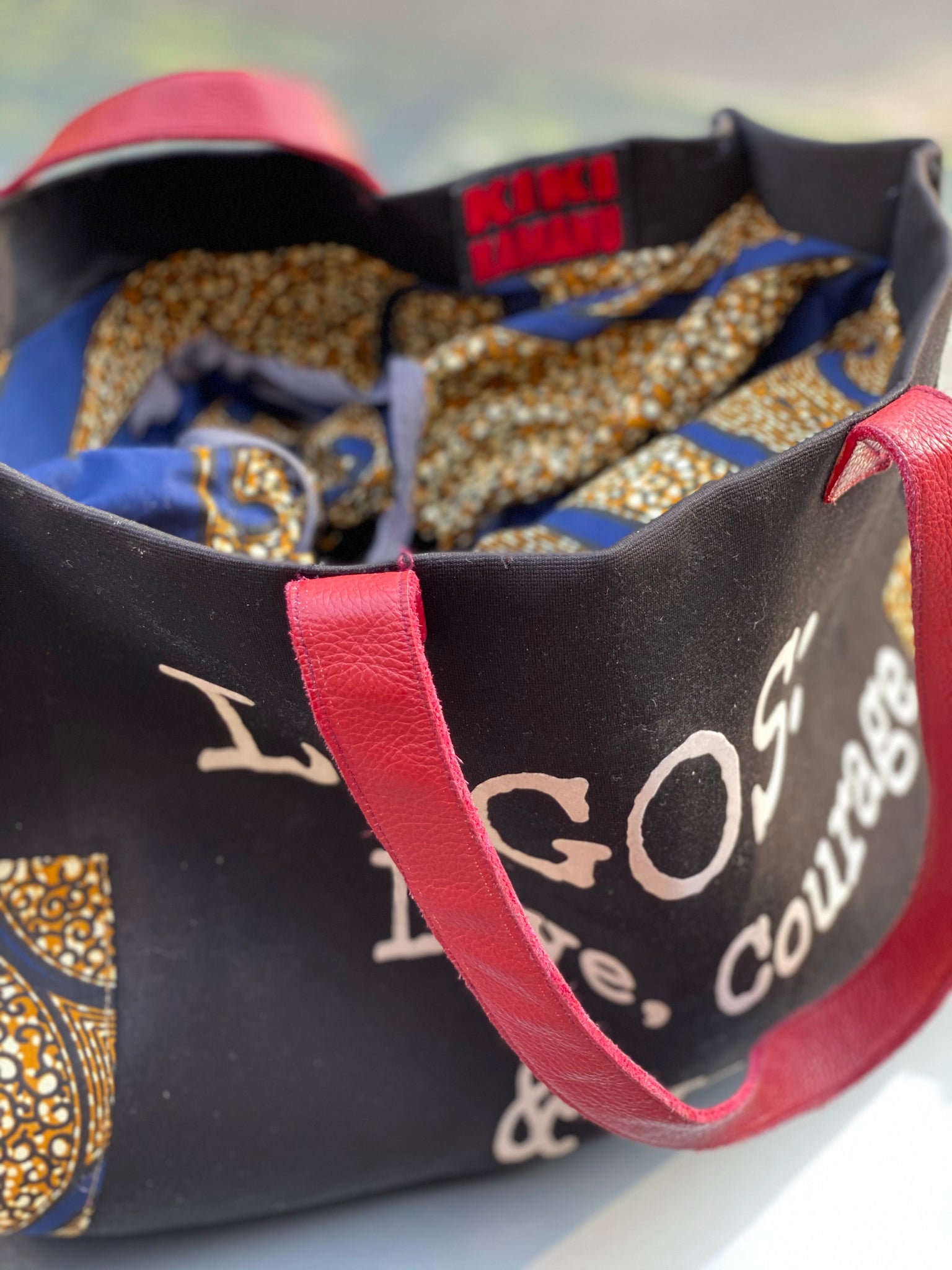 Sac fourre-tout trapèze en cuir : LAGOS : Love, Courage &Jollof