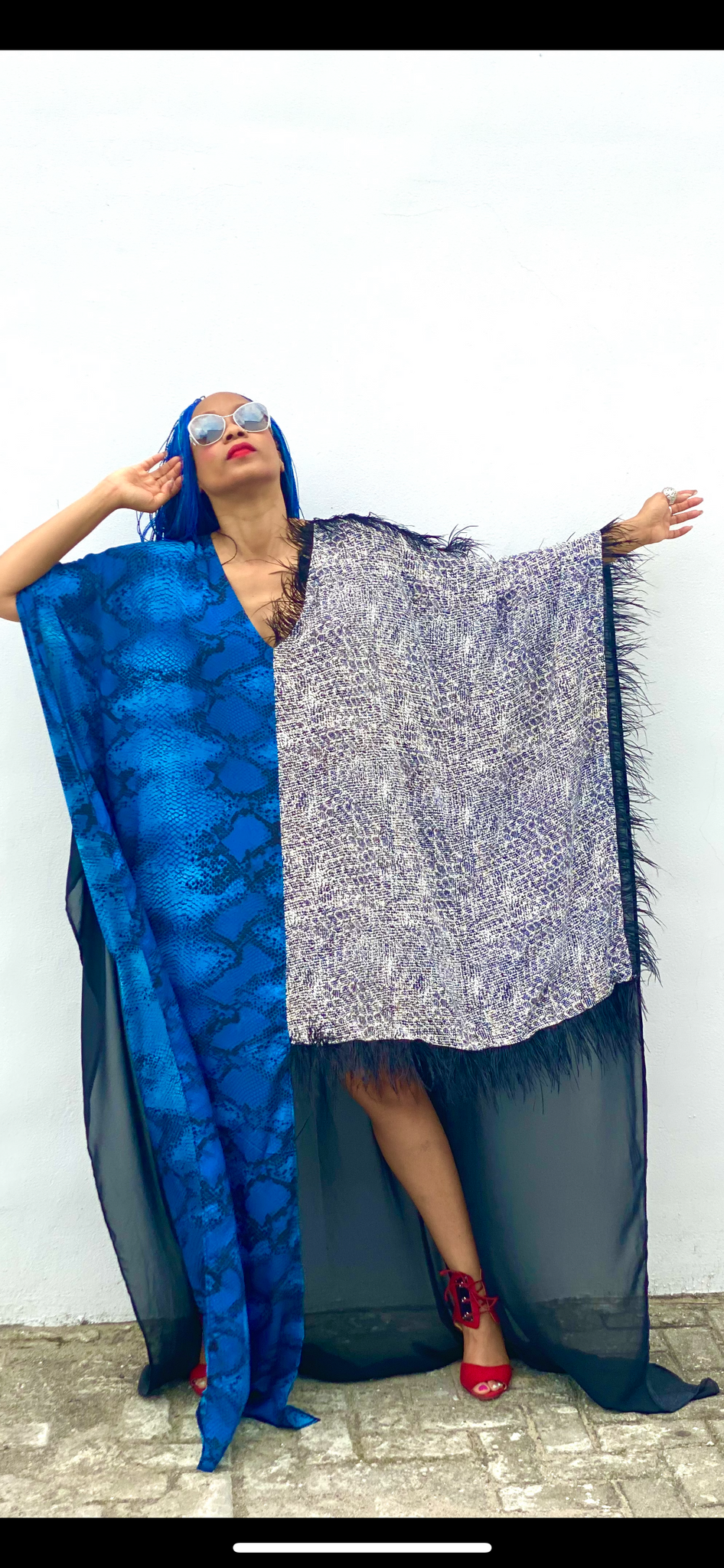 Robe impératrice Mombasa avec détails en plumes