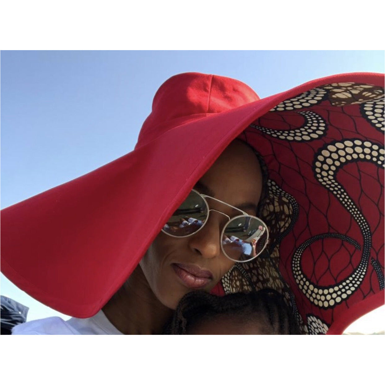 Chapeau réversible GoodHeadz à imprimé coccinelle/rouge